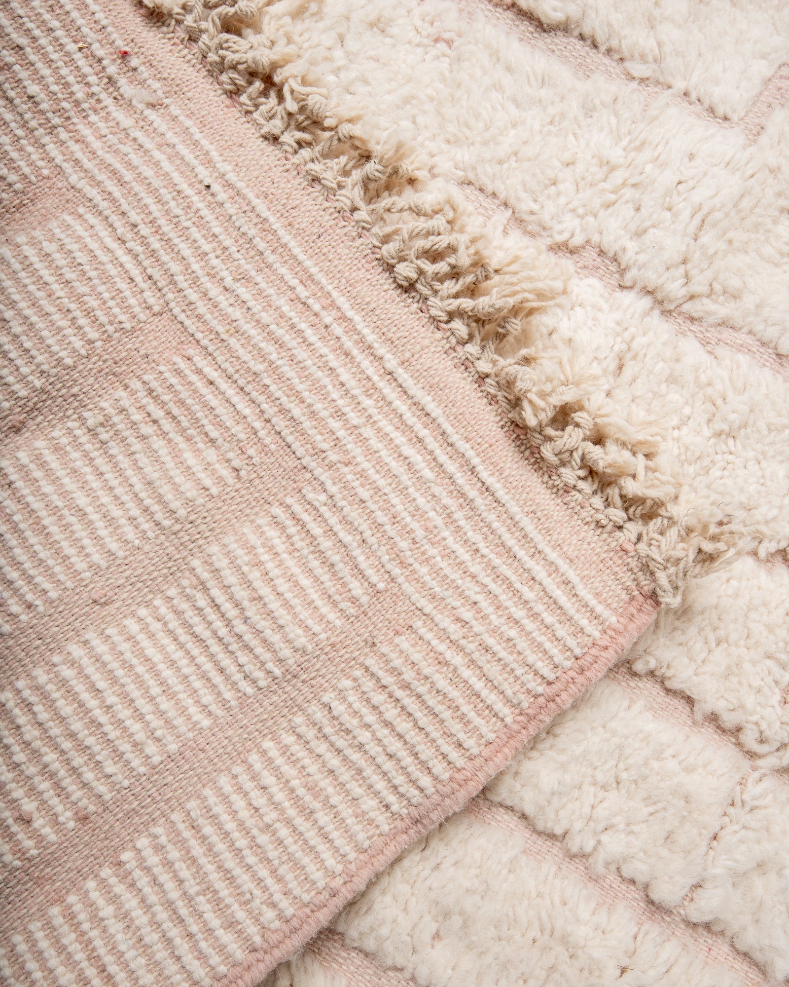 Modern, designer, handcrafted Berber rug from Morocco. Beniourain carpet with beautiful colours and patterns and fluffy wool texture.
